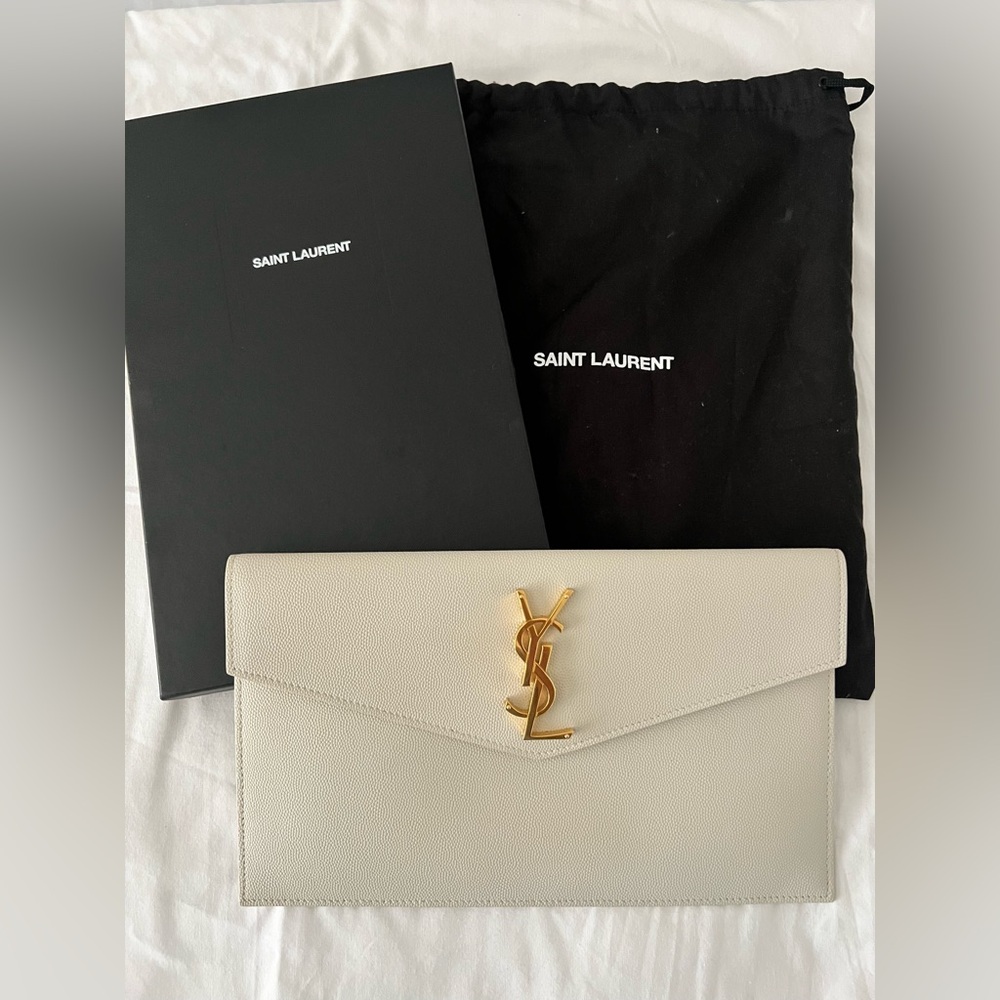 Saint Laurent Gold Logo Cream Clutch (authentic)